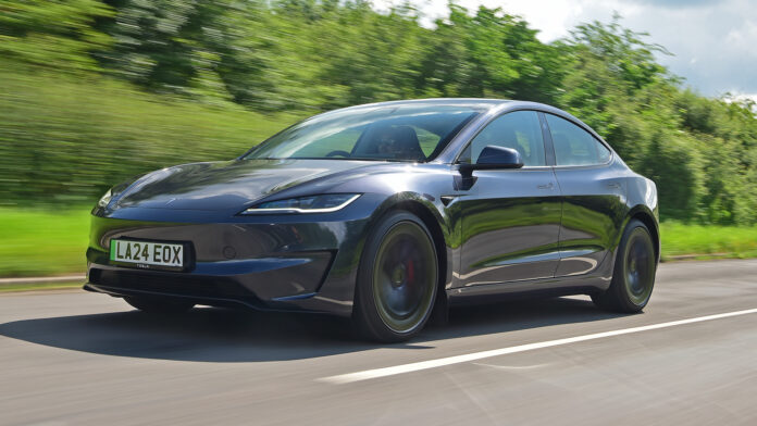 aCxkIidWJ-7kSVx9_TeslaModel32025exteriorfrontthreequarterviewdriving