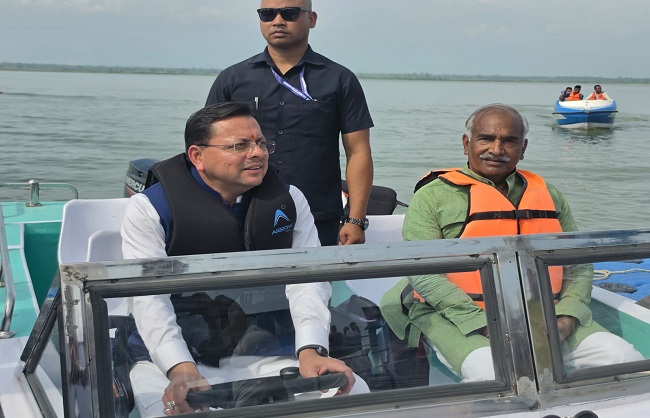 मुख्यमंत्री पुष्कर सिंह धामी अंतर्राष्ट्रीय क्याकिंग एवं कैनोइंग प्रतियोगिता की तैयारियों का स्थलीय निरीक्षण करते हुए। मुख्यमंत्री पुष्कर सिंह धामी अंतर्राष्ट्रीय क्याकिंग एवं कैनोइंग प्रतियोगिता की तैयारियों का स्थलीय निरीक्षण करते हुए।
