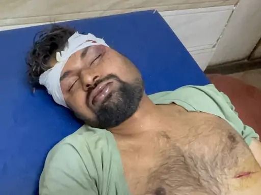घायल युवक की तस्वीर घायल युवक की तस्वीर