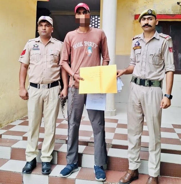 साजिद हुसैन की गिरफ्तारी की तस्वीर साजिद हुसैन की गिरफ्तारी की तस्वीर